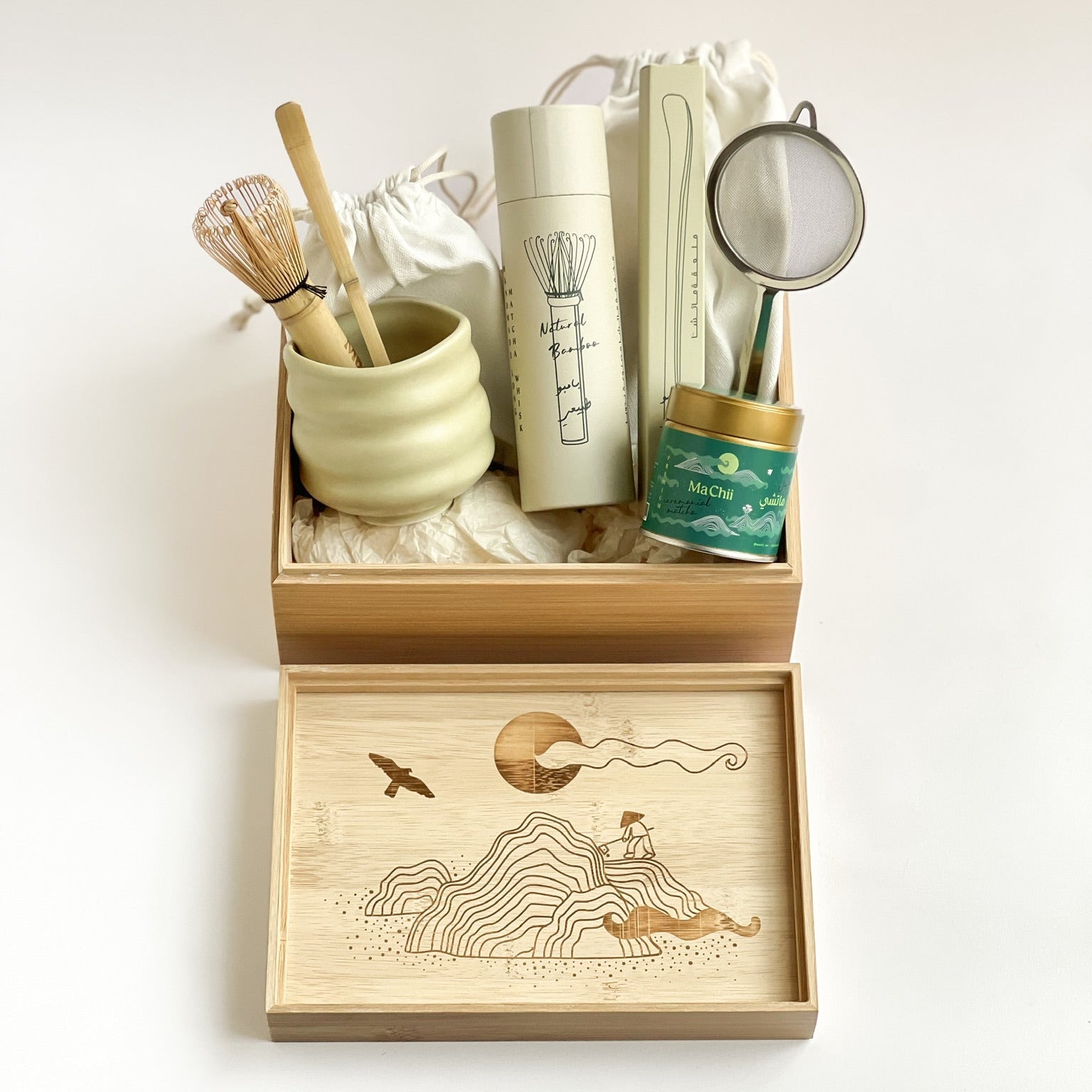 Tea-making set with wooden box on a white background