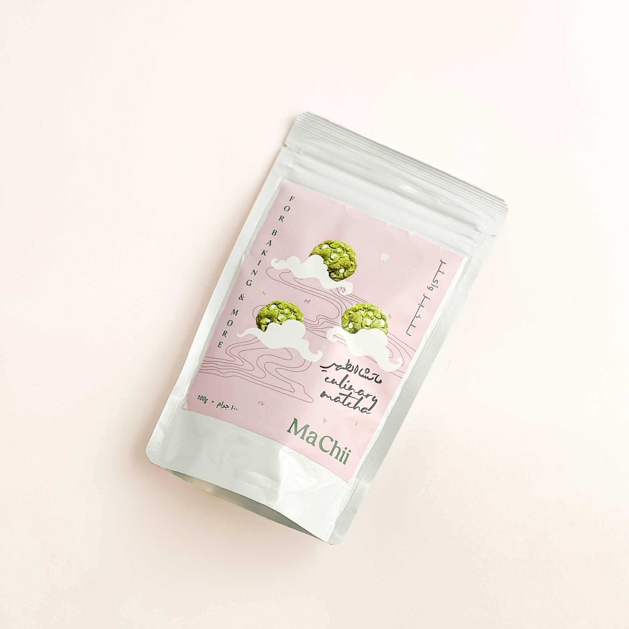 organic culinary matcha for cooking and baking. the ziplock bag is placed over a wooden plate